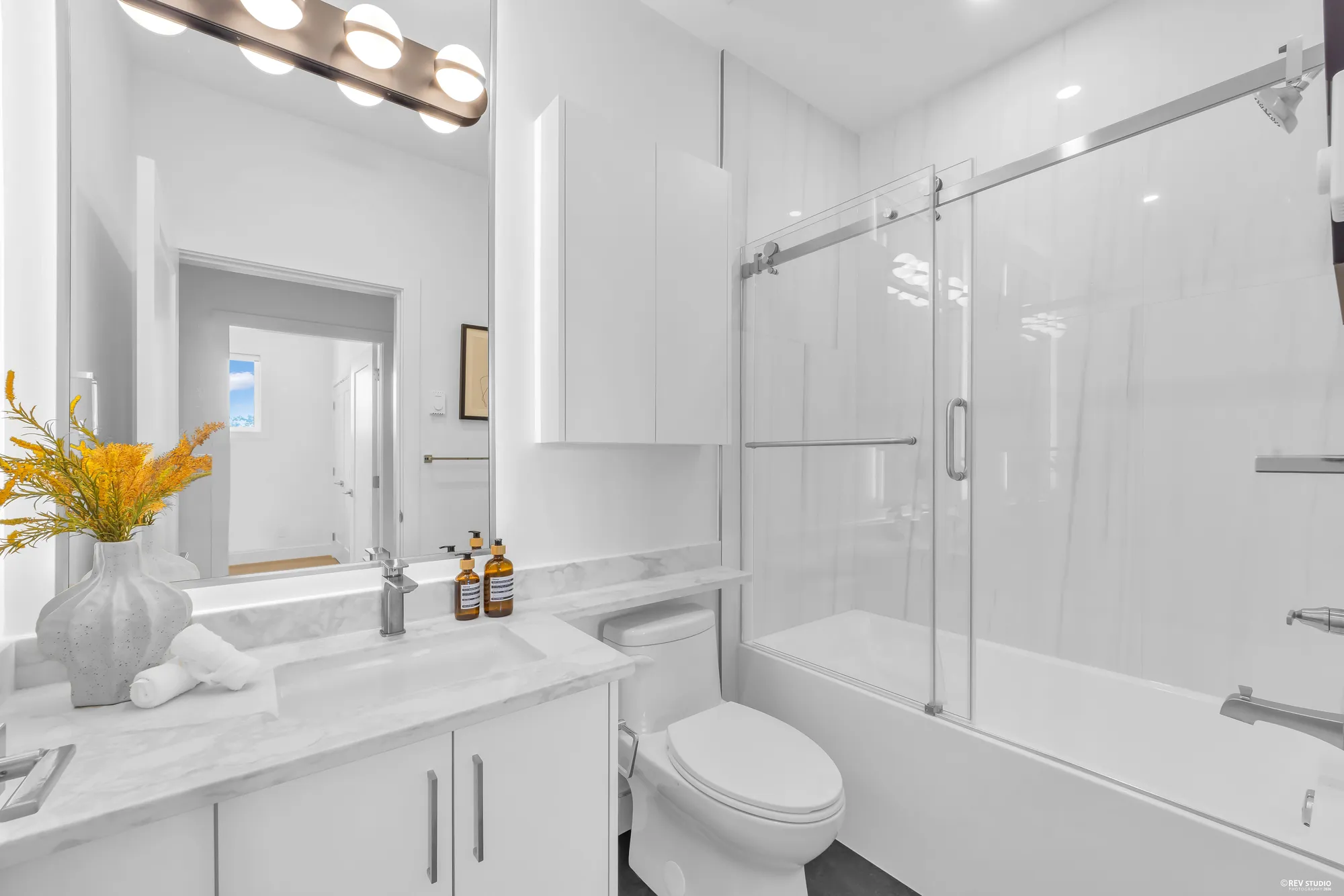 Main floor bathroom with a shower