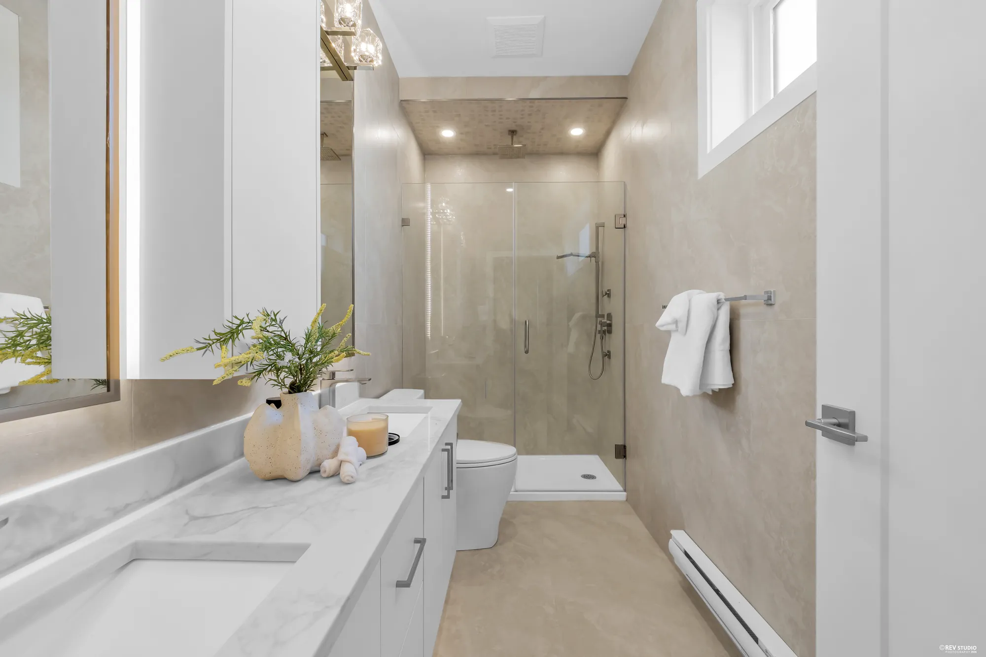 Ensuite walk-in shower in large-format tile