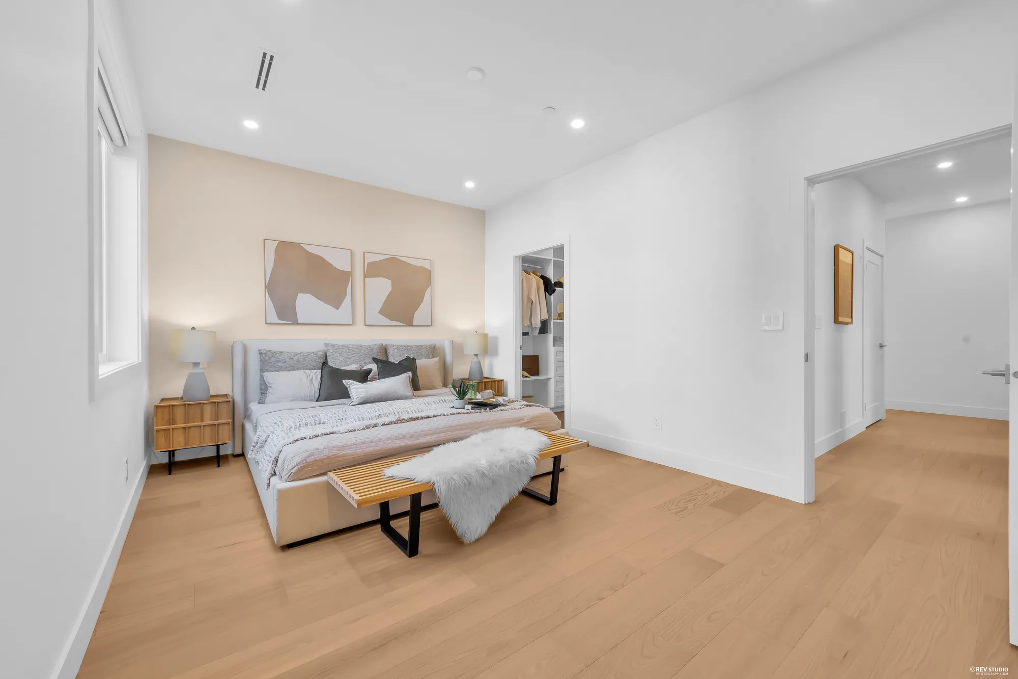 Primary bedroom toward the walk-in closet and ensuite